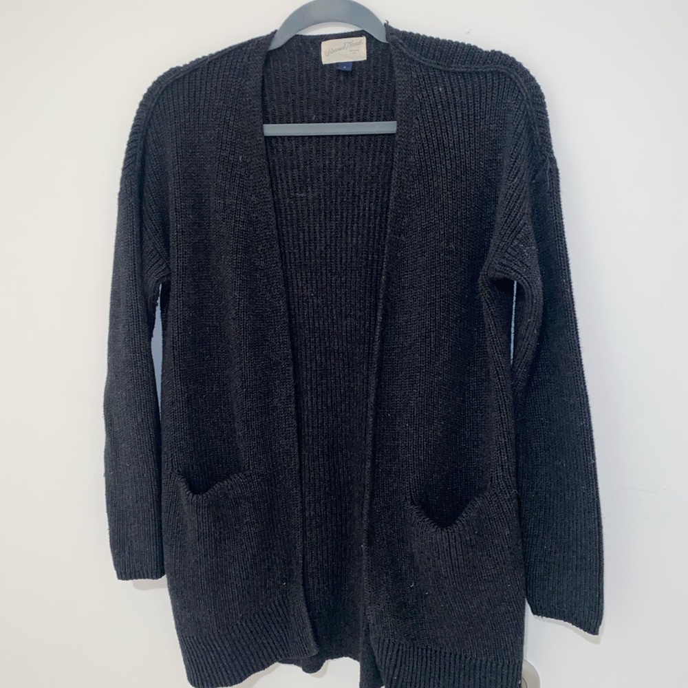 Gently worn grey knit sweater